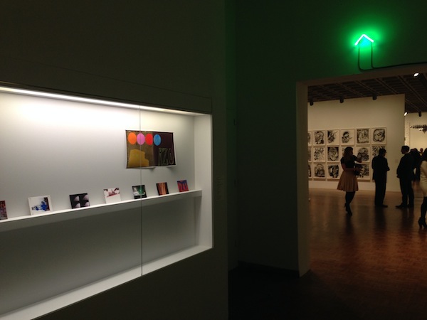 Academy Records / Matt Hanner, "The Spectre," 2014, Whitney Biennial installation view with Matt Hanner's various printed ephemera and neon sculpture "Tomorrow is still above you" 
